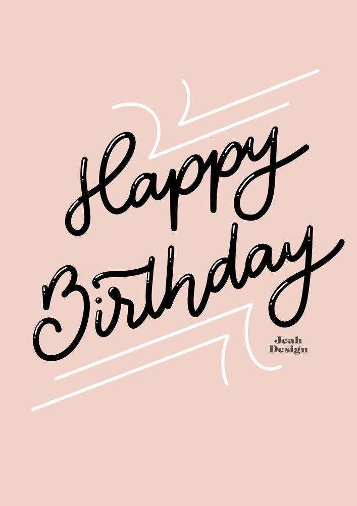 A pale pink hand-lettered birthday card with "Happy Birthday" written in monoline script on it.